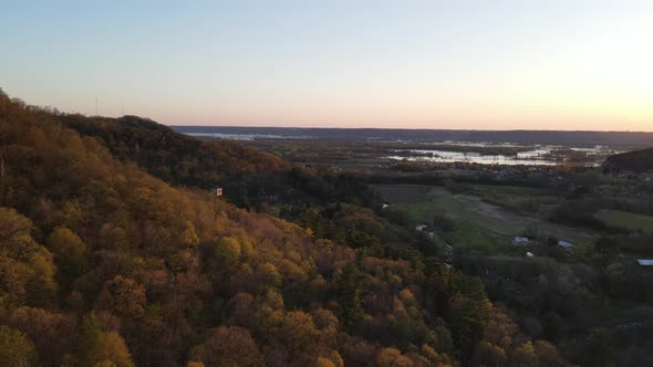 Amazing aerial view around the mountain in autumn of farm field, Mississippi River, and string.