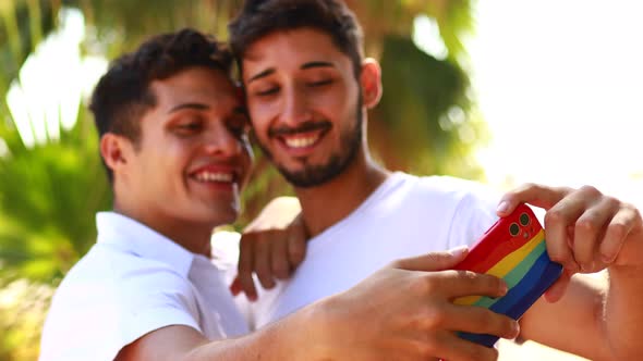 Young Same Sex Couple in Love Outdoors Together Showing All of Feels alt