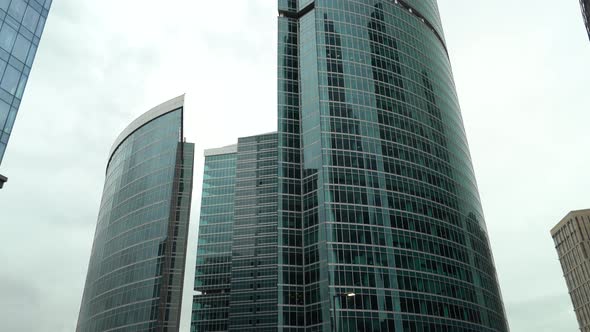 glass facade of business center. dolly camera shot alt