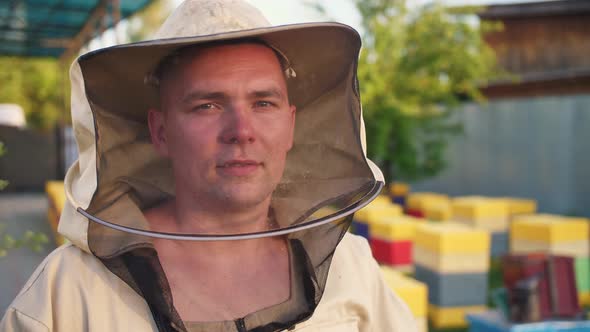 Portrait of a Young Owner of an Apiary on Which He Breeds Bees and Extracts Honey