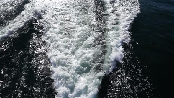 Sea Waves Foam Behind The Ferryboat