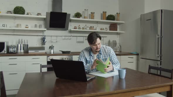 Married Couple Reading Eviction Notice in Kitchen alt