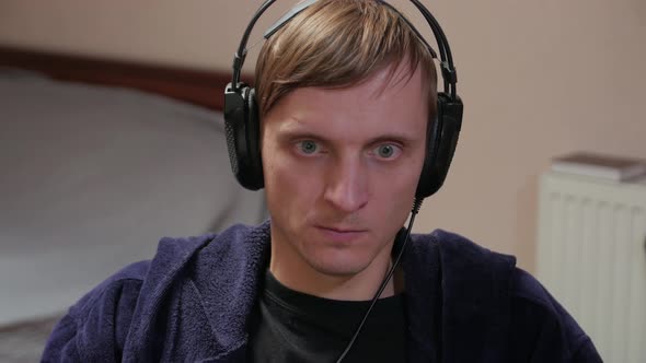 Expressive Gamer At Computer alt