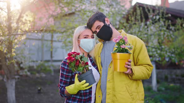 Lady and Man Support Each Other in the Quarantine alt