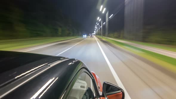 Drivelapse From Top Side of Car Moving on a Night Highway Timelapse Hyperlapse alt