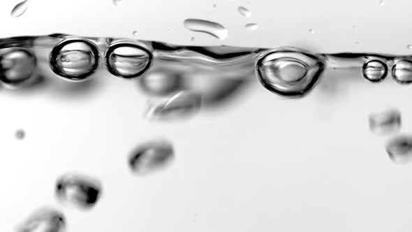 Bubbles Rising Up on White Background alt