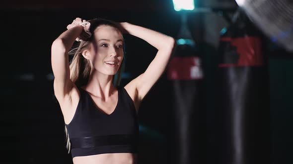 Portrait Of Confident Young Woman In Gym alt