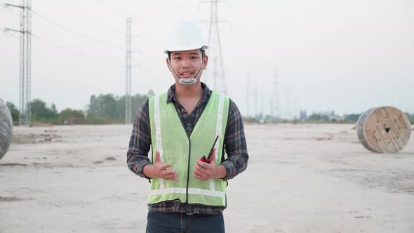 portrait of Electricity engineer in the construction of a power line