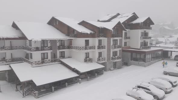 Flying over mountain resort Crystal in Bakuriani. Snowy winter day. Georgia alt