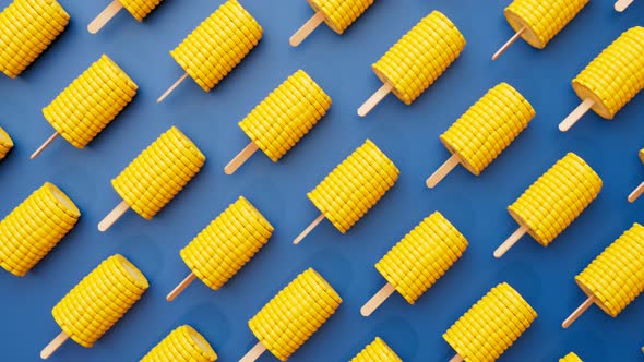 Animation of corns on the cobs. Boiled sweetcorn on wooden skewers. Vegetables. alt