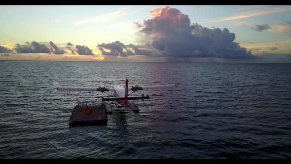 Aerial top view travel of beautiful coastline beach trip by turquoise ocean and white sandy backgrou alt