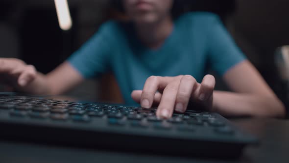 Caucasian Young Teen Guy Plays Games On Computer And Streams The Games Live alt