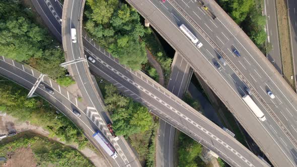 Vehicles Driving on a Mixing Interchange Bird's Eye Aerial View alt