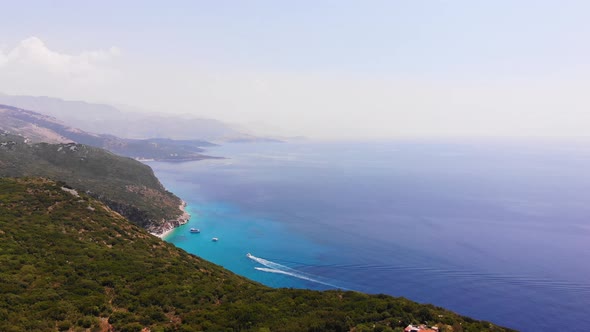 Aerial Drone View of Gjipe Beach and Canyon Dhermi Albania Hidden Paraside with Boats Tourists alt