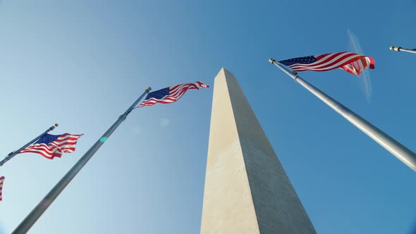 Pan Shot: American Flags and the Washington Monument alt
