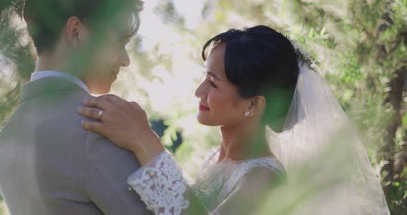 Asian Bride And Groom In Wedding Dress Prepare For Married In Wedding Ceremony. alt
