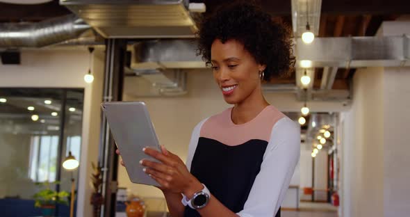 Businesswoman using digital tablet in modern office 4k