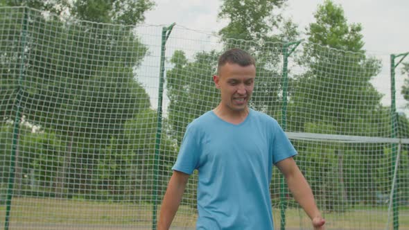 Soccer Player Expressing Dissatisfaction By Failure to Score Goal alt