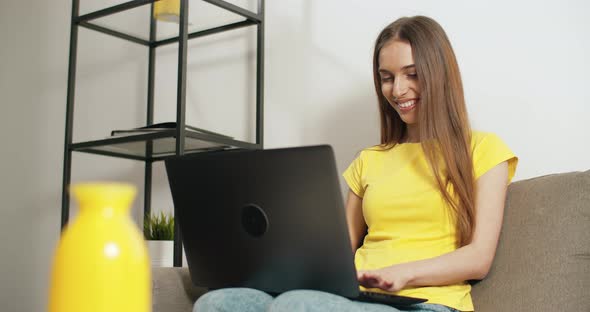 Freelancer Woman Works on Laptop