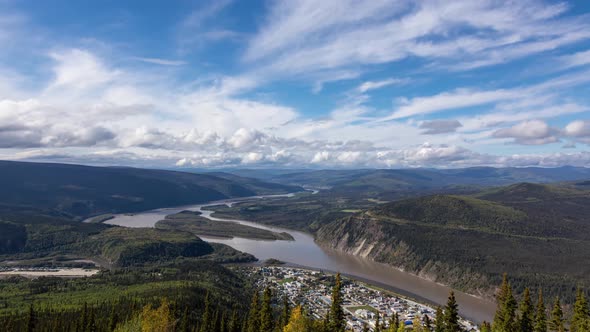 Timelapse, View of Dawson City From Above on a Cloudy and Sunny Day alt