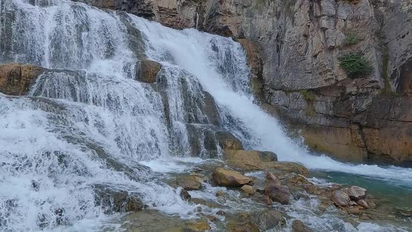 Slow motion panning view of Granite Creek Waterfall in Wyoming alt