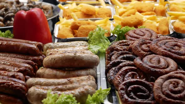 Traditional Street Food. Grilled Food Lie on the Counter of a Street Market. Various Sausages alt