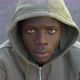 angry serious young black man raises his head and staring at camera - VideoHive Item for Sale