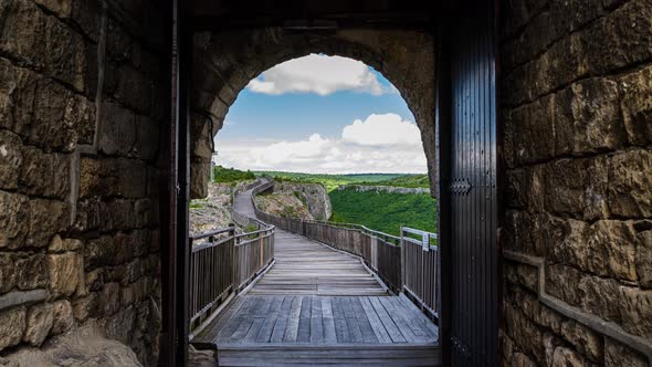 Time lapse with moving clouds over the medieval fortress alt