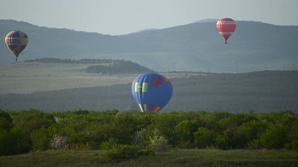 Beautiful Rocky Landscape of Crimea with Colorful Hotair Balloons Balloons Flying on Sunset HDR Time alt