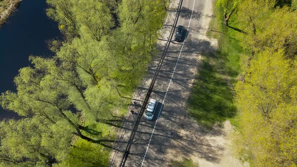 Car Moving on the Road in Europe Small Town Aerial View alt