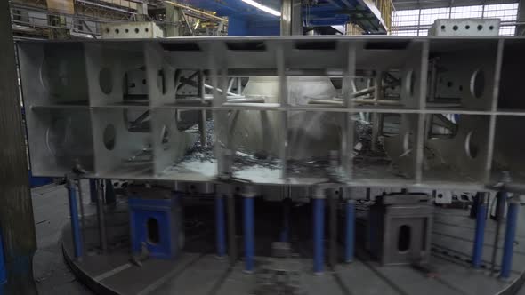 A Huge Lathe is Used in Order to Help the Production of the Gas Turbine Parts alt