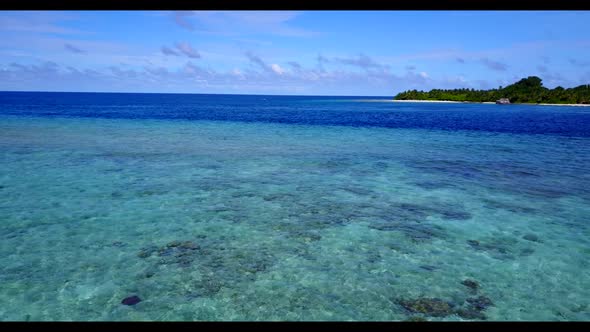 Aerial drone scenery of tranquil sea view beach voyage by blue ocean with white sandy background of  alt