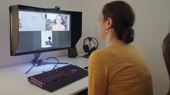 Teacher hosts an online lesson during the 2020 COVID-19 pandemic lockdown alt