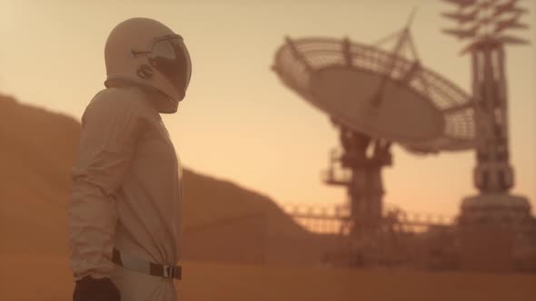 Astronaut Wearing Space Suit on the Surface of Mars alt