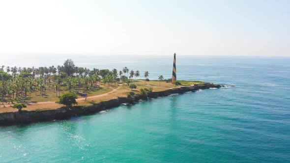 Palm Trees View Near A Lighthouse