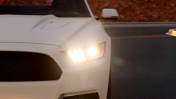 Close-up White Sports Car on the Asphalt Road