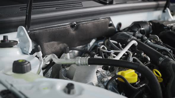 Car Engine Under the Hood of a Modern Car alt