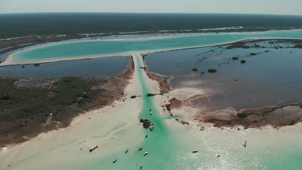 Aerial Shoot of Canal in the Bacalar Lagoon with Boat
