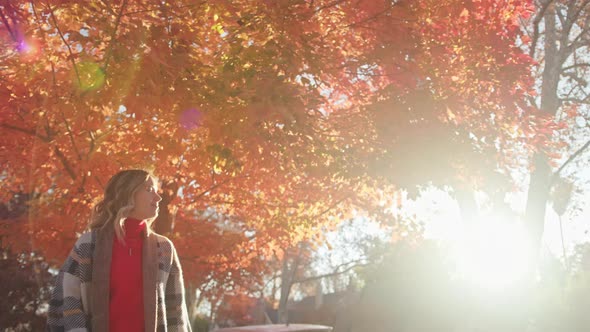 Happy Pretty Woman in 30s Walking in Autumn Countryside Alone on Sunny Warm Day alt