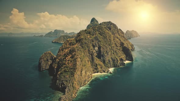 Uninhabited Island at Blue Ocean Bay at Sun Shine Aerial View alt