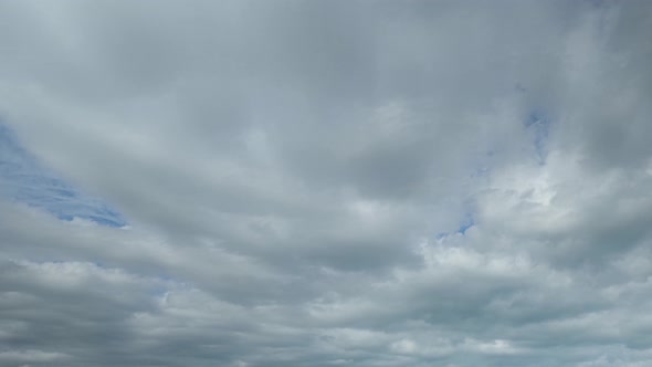 4K Sky Time lapse, Beautiful background, Sky Timelapse of skyscrapers. alt