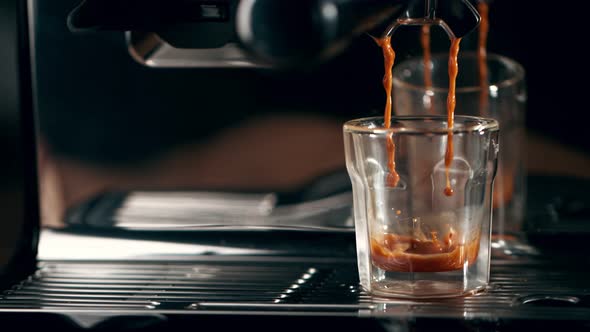 Super Slow Motion Shot of Coffee Machine Pouring Espresso at 1000Fps alt