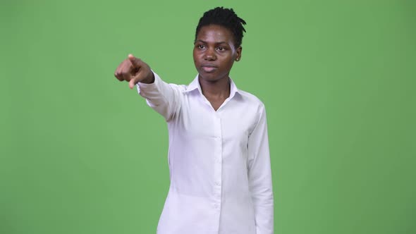 Young Beautiful African Businesswoman Pointing Finger