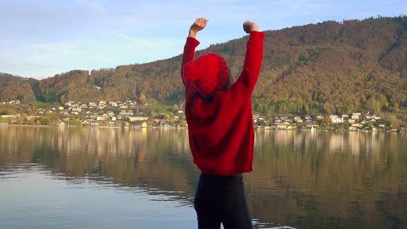Beautiful Calm Woman Sitting on Rock Coastline alt