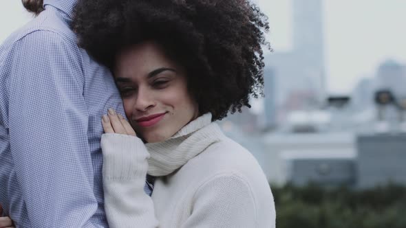 Romantic couple on rooftop in New York