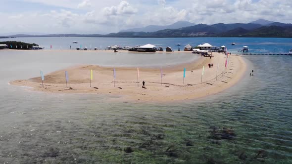 Aerial view of Tourists at the Beach alt