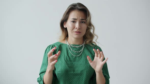 Slow Motion of Miserable Woman Crying and Shaking Head Feeling Sadness Over Bad News alt