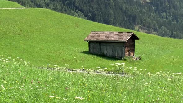 A small house in the slopes of the Alps. Liechtenstein.