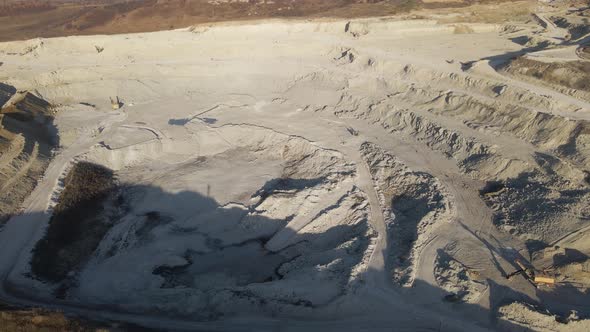Aerial View of Open Pit Mine of Sandstone Materials for Construction Industry with Excavators and alt