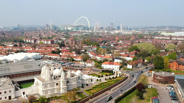 Ariel view of Brent in London with Wembley Stadium skyline and the Neasden Hindu Temple, BAPS Shri S alt